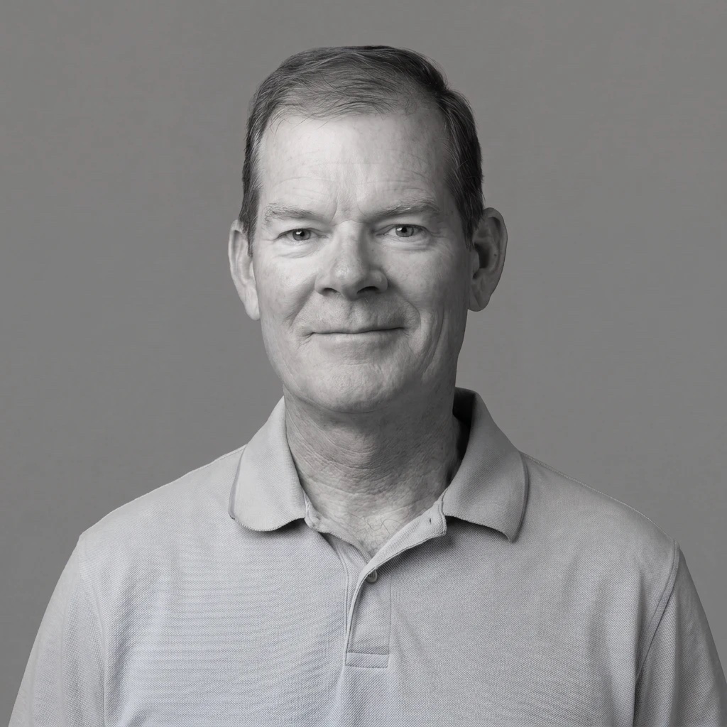 Black-and-white portrait of Darrin Waddle in a polo shirt